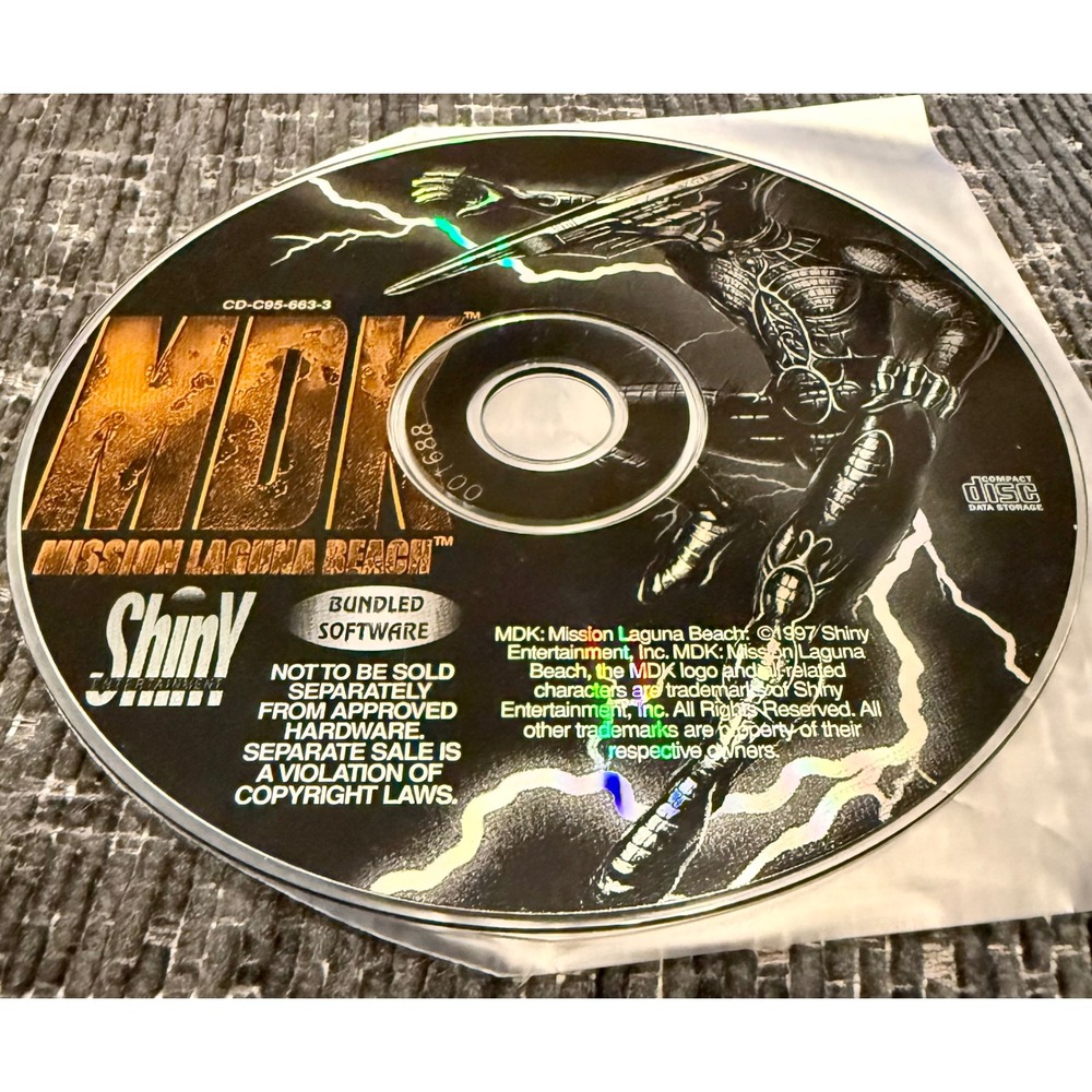 Shiny Entertainment MDK Mission Laguna Beach PC CD-ROM Disc 1997 Silver